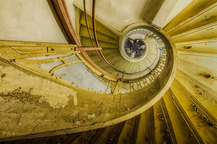 abandoned wooden spiral staircase